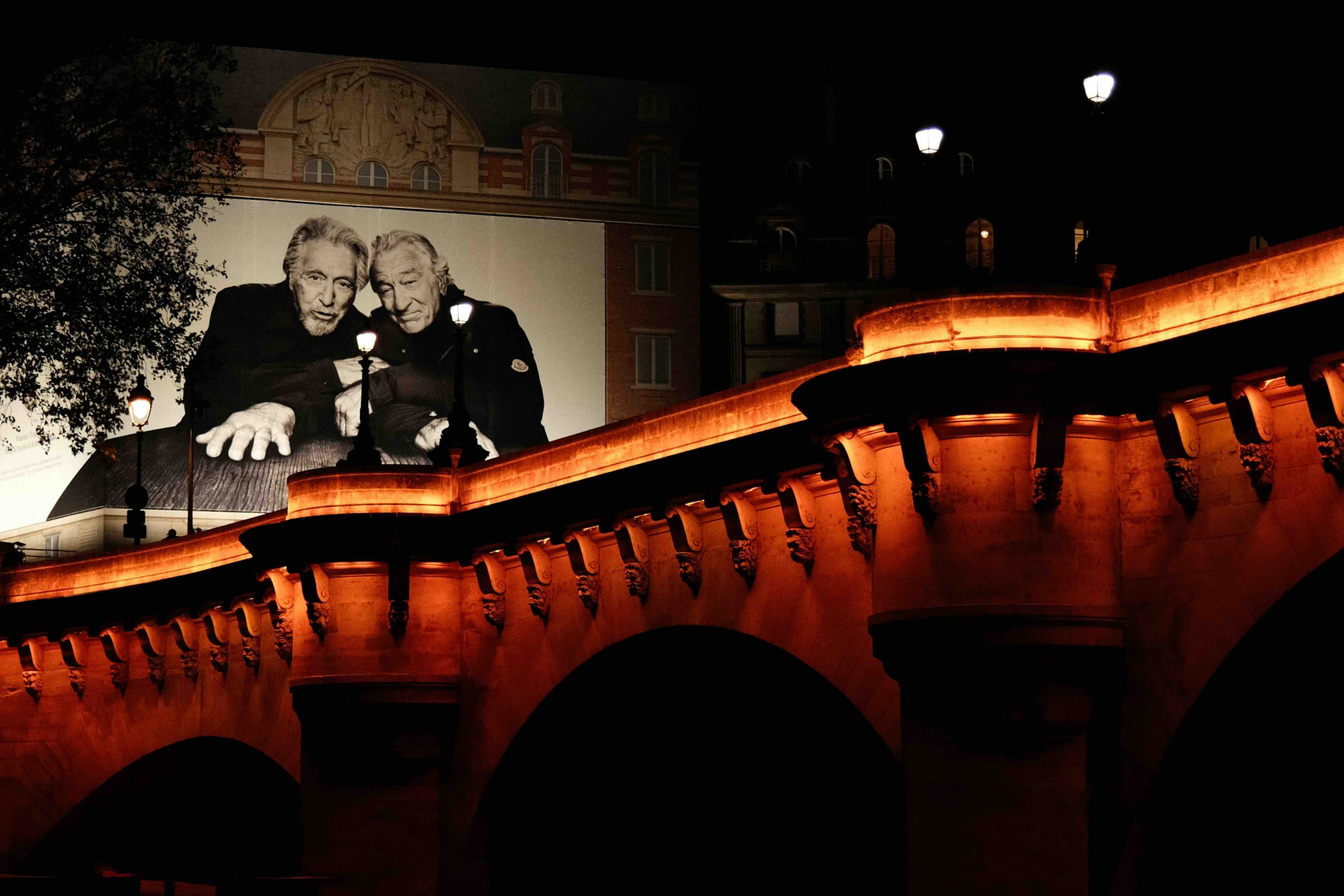 De Niro and Del Toro on a ferry in Paris
